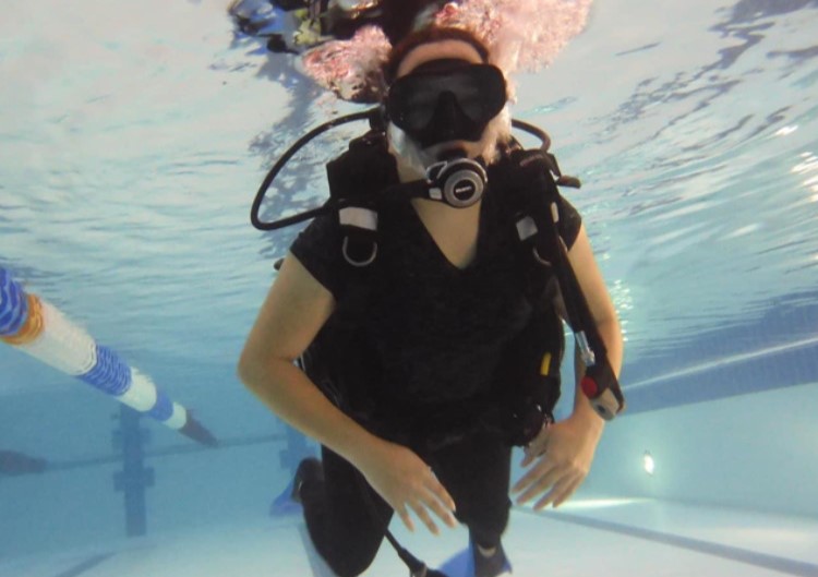 Student Lyea underwater scuba diving.